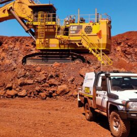 construction-heavy-equipment-backhoe-with-santrix-diesel-vehicle-in-quarry-site